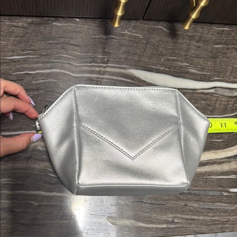 La Prairie Silver Cosmetic Bag with Geometric Design
